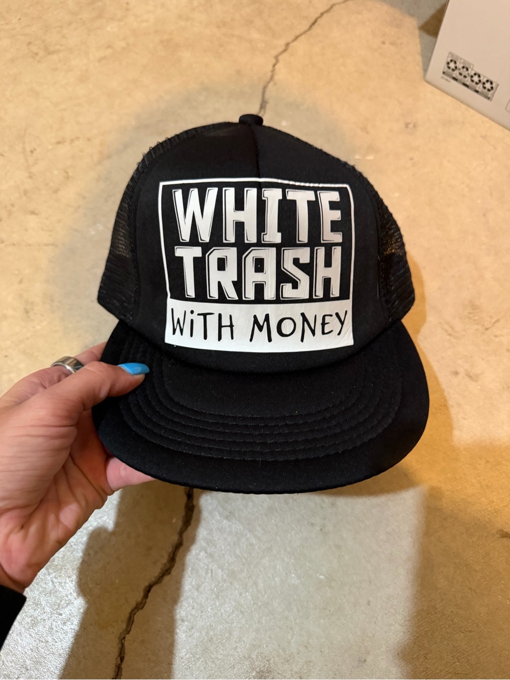 Black Statement Trucker Hat with 'White Trash With Money' Patch